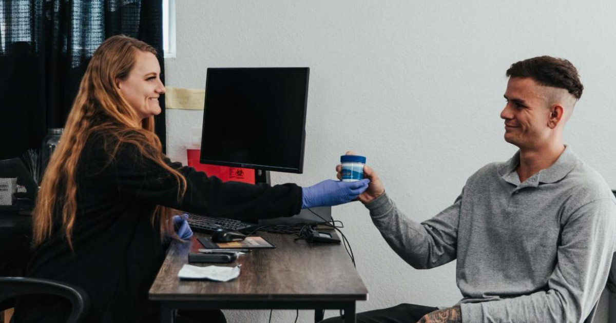 Axiom Care Detox Process & What to Expect - Caretaker Administering Meds