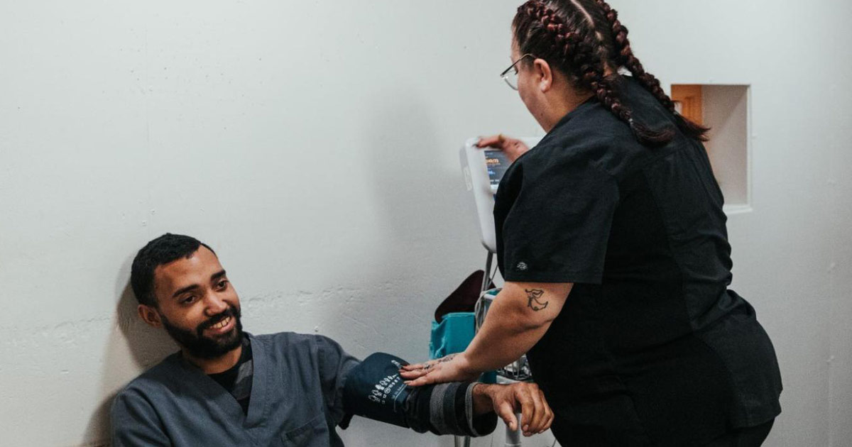 Axiom Care Detox Process & What to Expect - Healthcare Worker Taking Blood Pressure