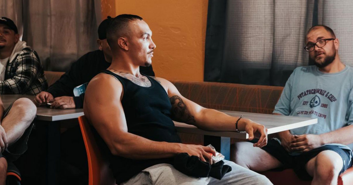 Group of Patients Sitting in Dining Hall
