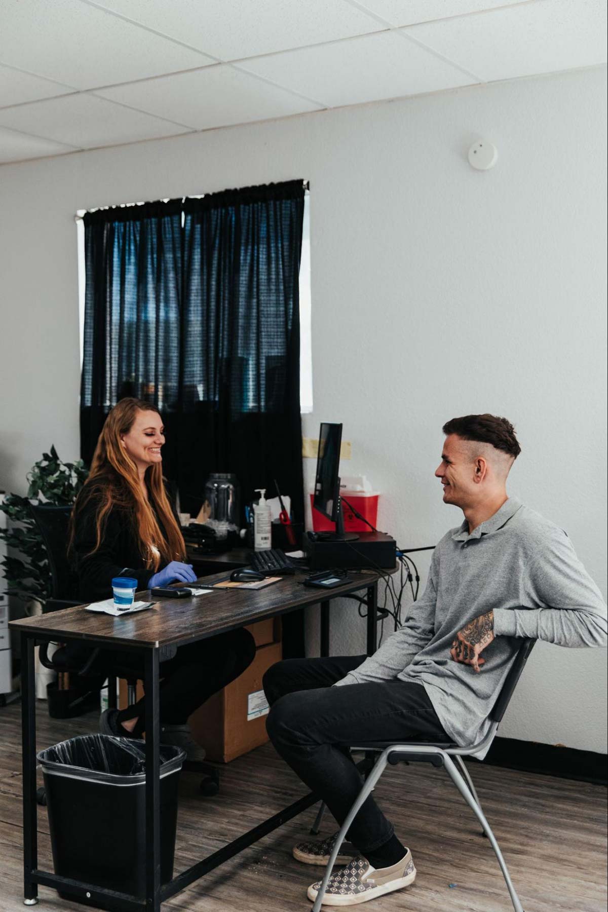 Patient Sitting with Addiction Care Specialist